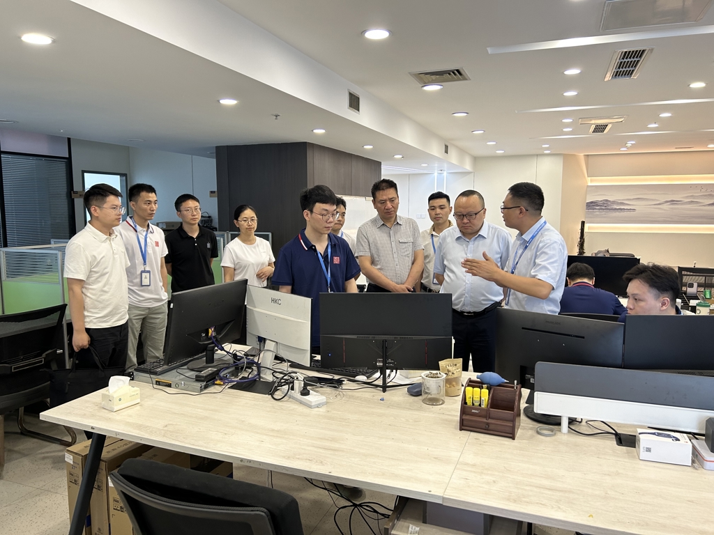 德阳市天府数谷主任吴健带队赴铭中尧发展集团成都总部交流考察数字经济项目